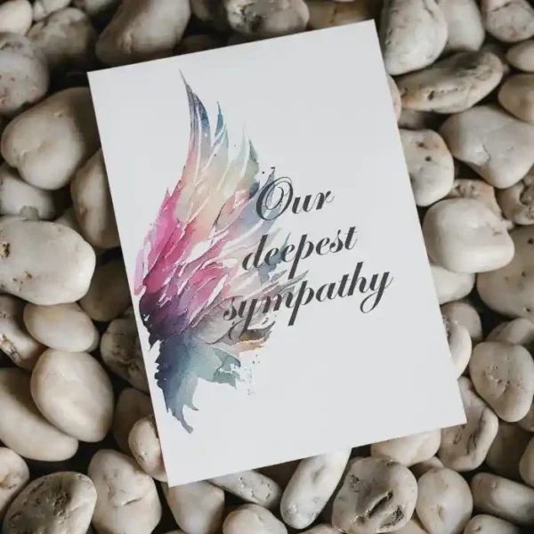 Printable condolence card featuring angel wings, expressing deepest sympathy and support during a difficult time.