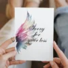Printable condolence card featuring angel wings, expressing deepest sympathy and support during a difficult time.