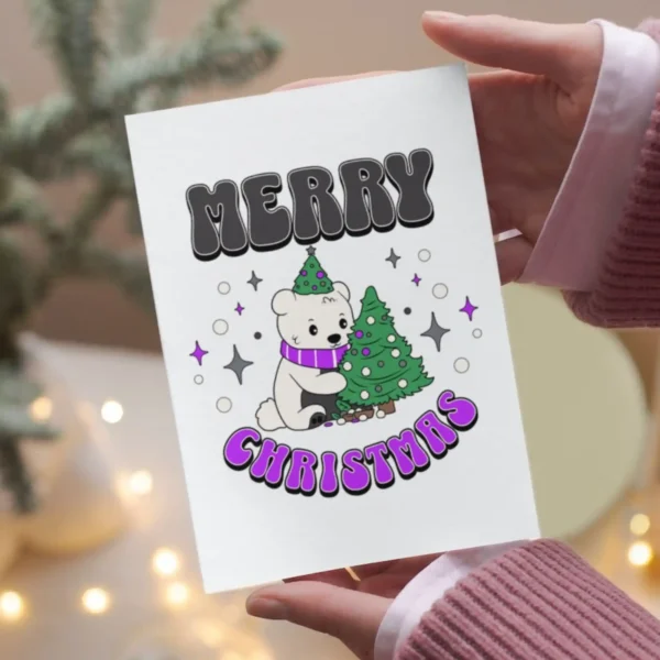A printable Christmas card showcasing a cheerful polar bear, perfect for asexual holiday greetings.