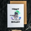 Cute space explorer card with stars and “Happy Birthday” text