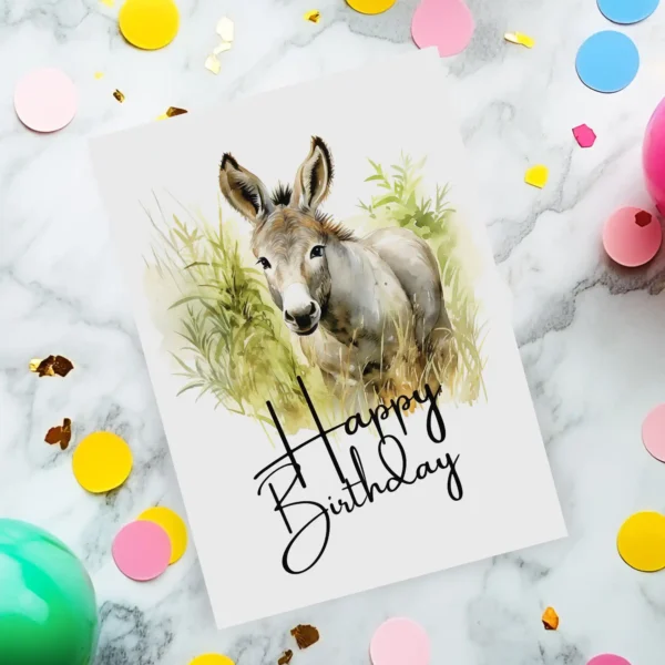 Colorful watercolor drawing of a smiling donkey with a "Happy Birthday" message, ideal for a printable birthday card.