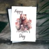 Heartwarming Mother's Day card design showcasing a bear and cheerful flowers, ideal for printing.