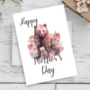 Adorable bear-themed Mother's Day card adorned with vibrant flowers, perfect for printing.