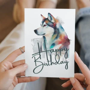 Happy birthday card showcasing a joyful Siberian Husky in watercolor, ideal for celebrating a special day.