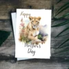 Watercolor lioness illustration on a Mother's Day card, capturing the essence of maternal love in the wild.