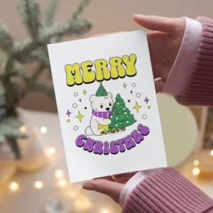 A joyful polar bear in a colorful scarf on a nonbinary Christmas card, set against a snowy backdrop for the holidays.
