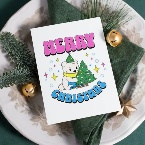 Cartoon bear beside a decorated Christmas tree on a pansexual-themed printable holiday card.