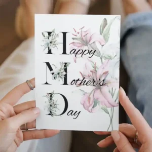 Happy Mother's Day card featuring vibrant lilies and a cheerful message, perfect for celebrating moms.