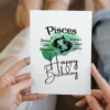 Pisces birthday card with character traits, designed with a green watercolor background reflecting the water element.