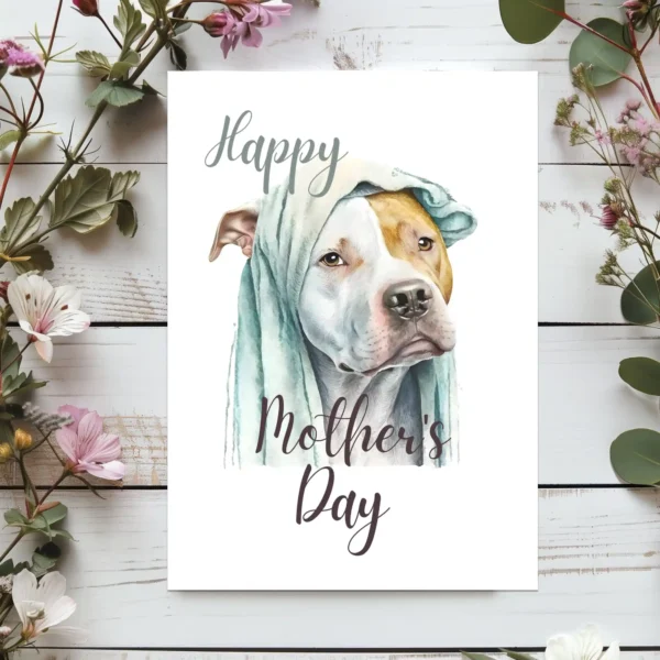 Charming watercolor image of a Pitbull under a blanket, made for a Mother's Day greeting card.