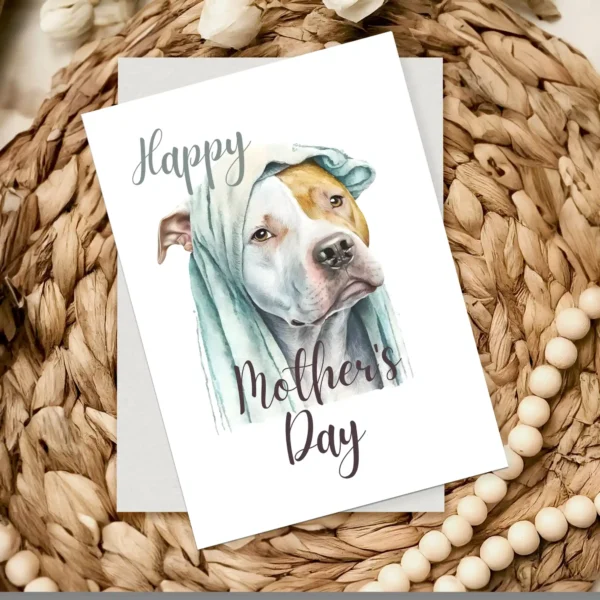 Cute watercolor of a Pitbull wearing a blanket, perfect for a Mother's Day card.