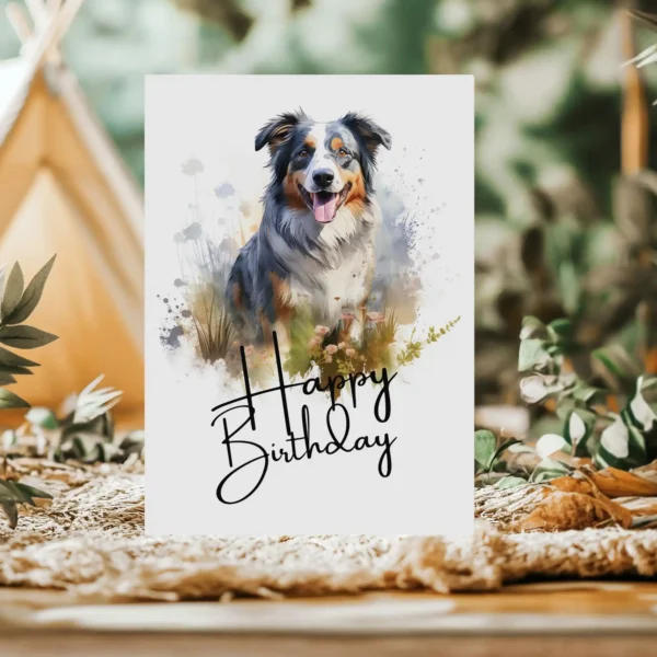 Printable birthday card for dogs, featuring a joyful Australian Shepherd in a watercolor scene with a "Happy Birthday" message.