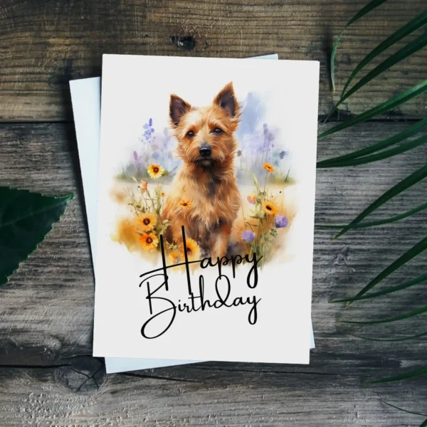 Festive birthday card featuring a Australian Terrier watercolor scene in nature, highlighted by a cheerful "Happy Birthday" message.