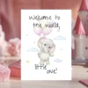 Adorable watercolor baby elephant card with balloons, celebrating a new arrival with the message "Welcome to the world!"