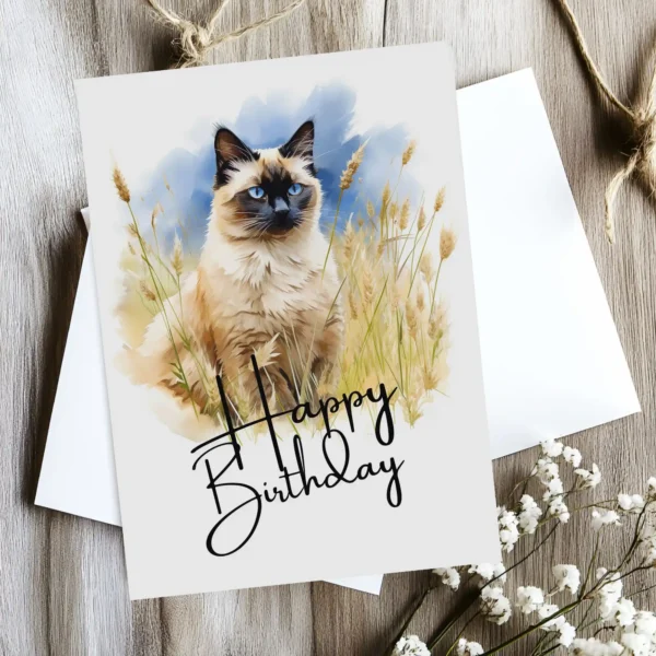 Watercolor birthday card showcasing a Balinese cat in a serene landscape, complete with a "Happy Birthday" message.