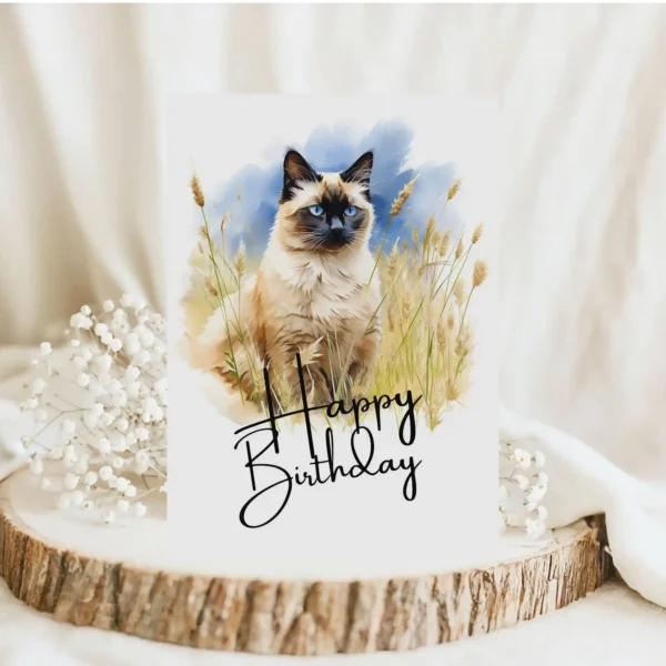 Delightful watercolor Balinese cat birthday card, featuring a natural backdrop and a joyful "Happy Birthday" message.