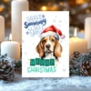 Printable Beagle Christmas card with red Santa hat, snowy background, and the message “There’s snowbody like you!”