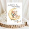 Boho-style card showing a teddy bear on the moon, celebrating a new baby with the message, "Welcome to the world, little one!"