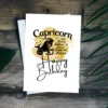 Printable Capricorn birthday card featuring character traits on a yellow watercolor background for the earth element.