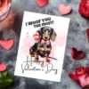 Valentine's Day card featuring a cute dachshund with the text "I Woof You The Most" for a playful touch.