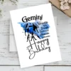 Festive Gemini birthday card with traits, adorned with a calming blue watercolor background representing the air element.