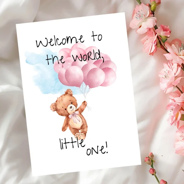 Sweet teddy bear card adorned with pink balloons, featuring the message, "Welcome to the world, little one!" in watercolor style.