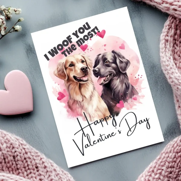 Cute Valentine's Day card with two retrievers and the phrase "I Woof You The Most," perfect for dog enthusiasts.