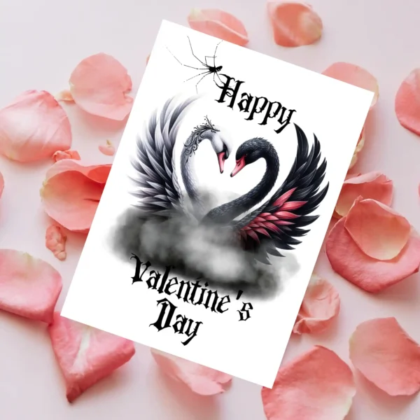 Happy Valentine's Day card with a white and black swan creating a heart shape with their necks against a white backdrop.