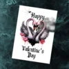 Printable Gothic Valentine's card featuring two pink swans in a heart shape, with a serene cloud background.