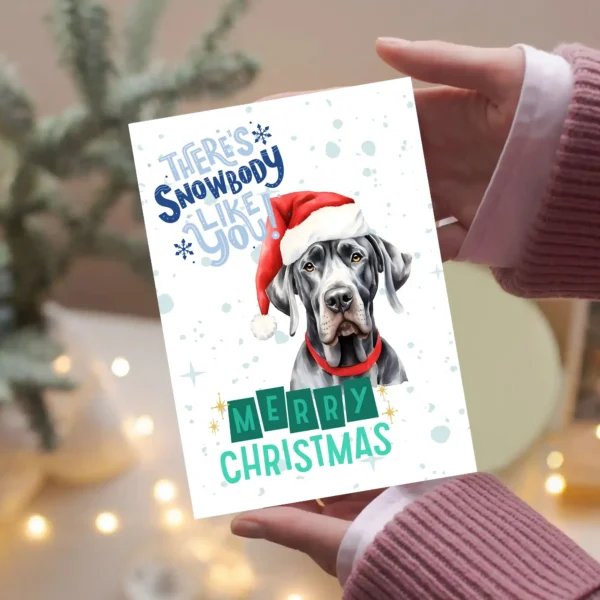 Great Dane wearing Santa hat in snow with playful Christmas greeting
