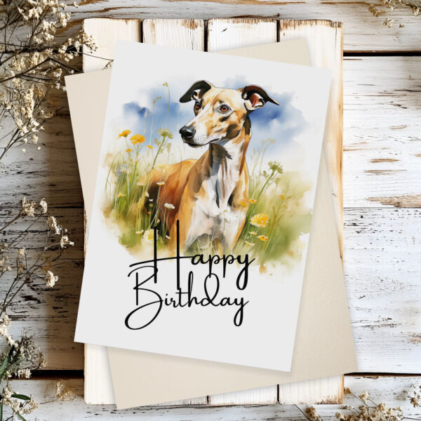 Cheerful birthday card with a greyhound in a natural scene, showcasing a watercolor design and "Happy Birthday" text.
