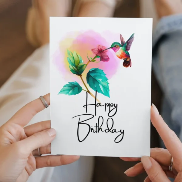 Printable birthday card with a charming hummingbird drinking from a flower, illustrated in soft watercolor tones.