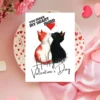 Charming printable card for Valentine's Day, showcasing kissing cats and the words "You Make My Heart Purr."