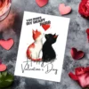 Adorable Valentine's card showing kissing cats, with the phrase "You Make My Heart Purr" for a sweet touch.
