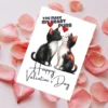 A cute Valentine card shows two black and white kittens kissing, accompanied by the phrase, "You Make My Heart Purr."