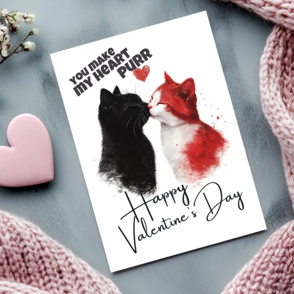 Charming printable card for Valentine's Day, showcasing kissing cats and the words "You Make My Heart Purr."