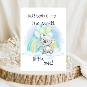 Watercolor baby shower card featuring a koala on a cloud with balloons and a rainbow, saying "Welcome to the world, little one!"