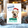 Printable Labrador Christmas card with red Santa hat, snowy background, and the message “There’s snowbody like you!”