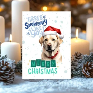Printable Labrador Christmas card with red Santa hat, snowy background, and the message “There’s snowbody like you!”