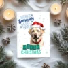 Festive Labrador dog card with snowflakes and cheerful holiday message