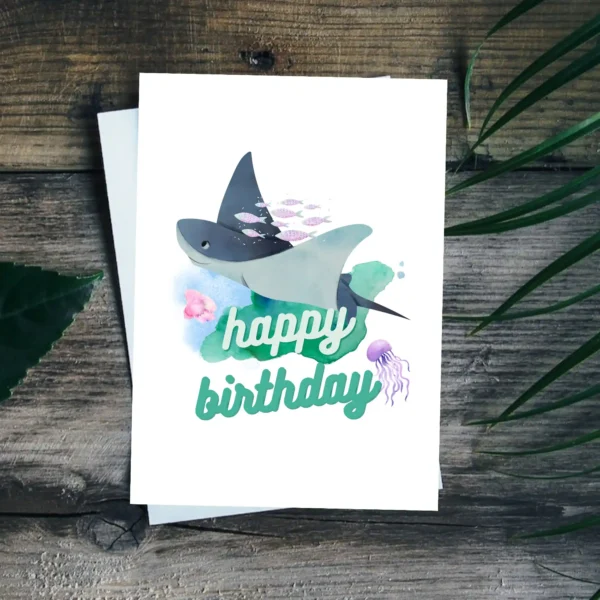 Ocean adventure birthday card with swimming manta ray and fishes