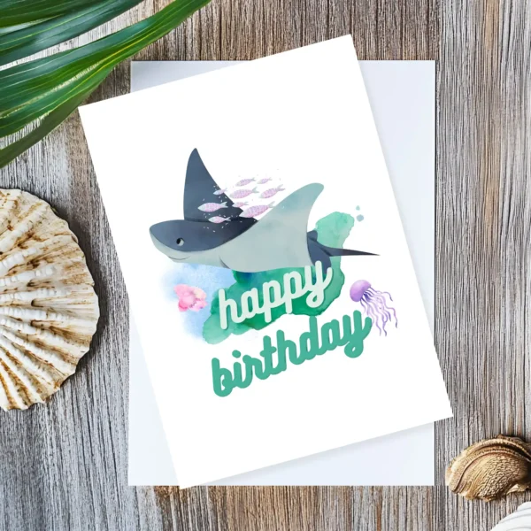 Watercolor manta ray birthday card with fish school and “Happy Birthday” message