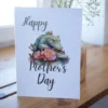 Fun printable Mother's Day card featuring a crocodile and a floral design, perfect for celebrating moms.