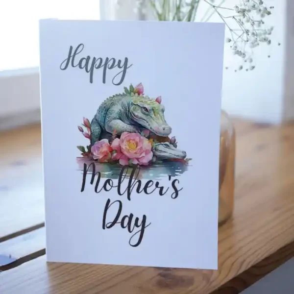 Fun printable Mother's Day card featuring a crocodile and a floral design, perfect for celebrating moms.