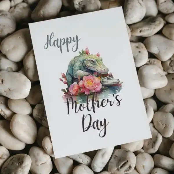Printable Mother's Day card featuring a cheerful crocodile surrounded by colorful flowers.