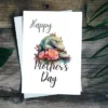 Adorable Mother's Day card with a smiling crocodile and a bouquet of flowers, ready for printing.