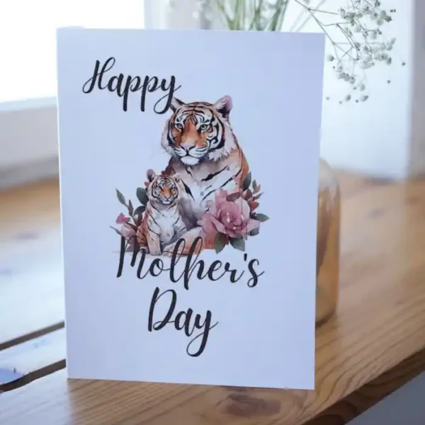 Adorable tiger and cub design on a printable Mother's Day card, highlighting the love between a mother and her baby.