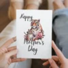 Charming tiger and baby artwork for a Mother's Day card, symbolizing the nurturing relationship of motherhood.