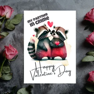 Printable Valentine's Day card showcasing a raccoon couple, adorned with "My Partner In Crime" and "Happy Valentine's Day" in watercolor.