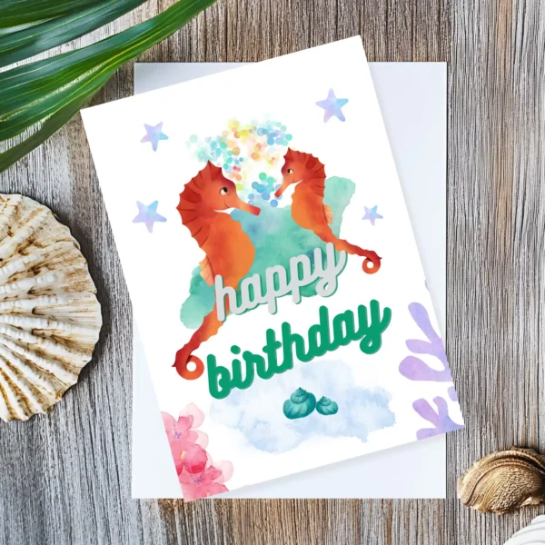 Printable birthday card featuring two seahorses and sea plants